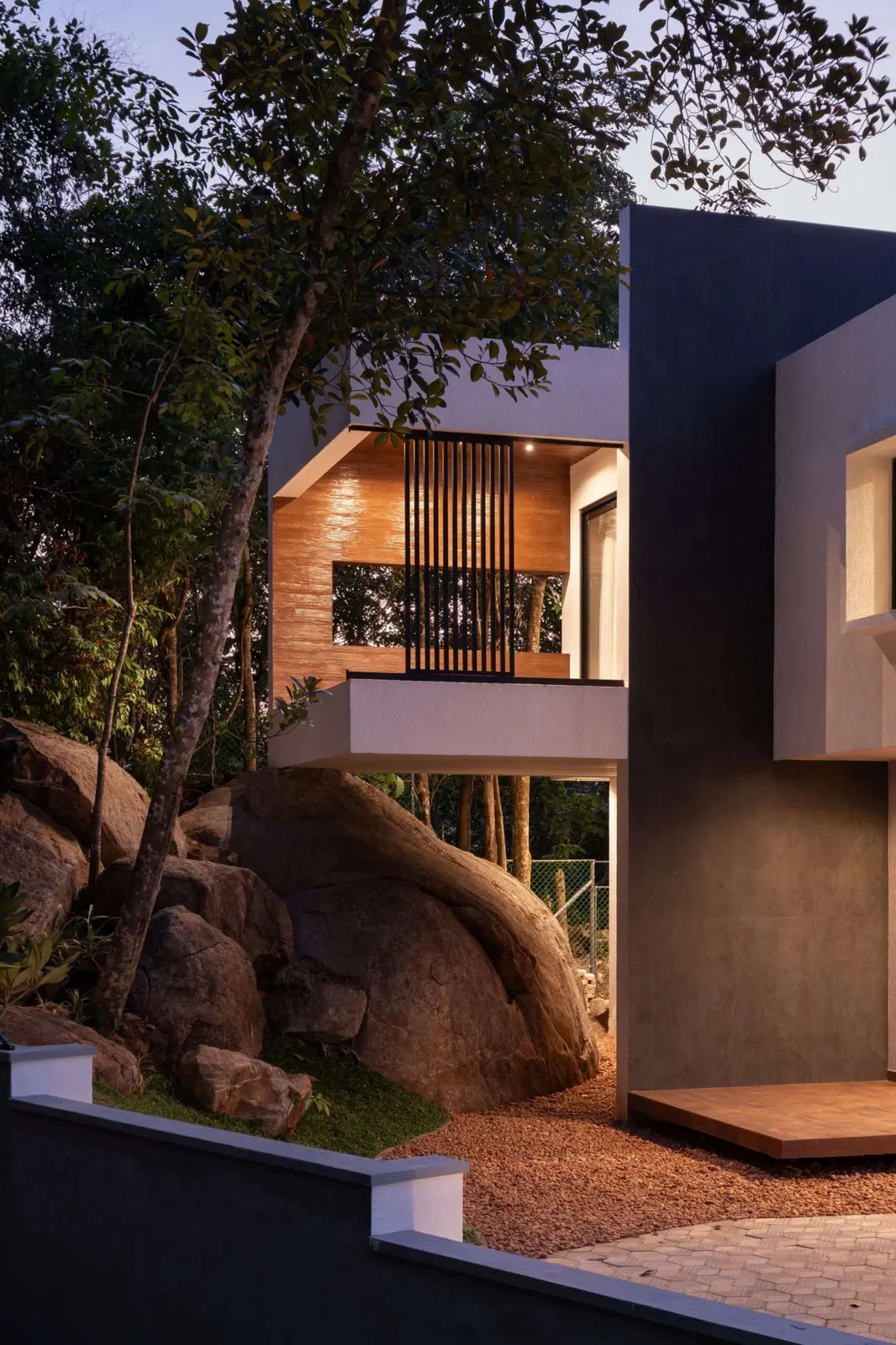 Residence beside a natural rock outcrop