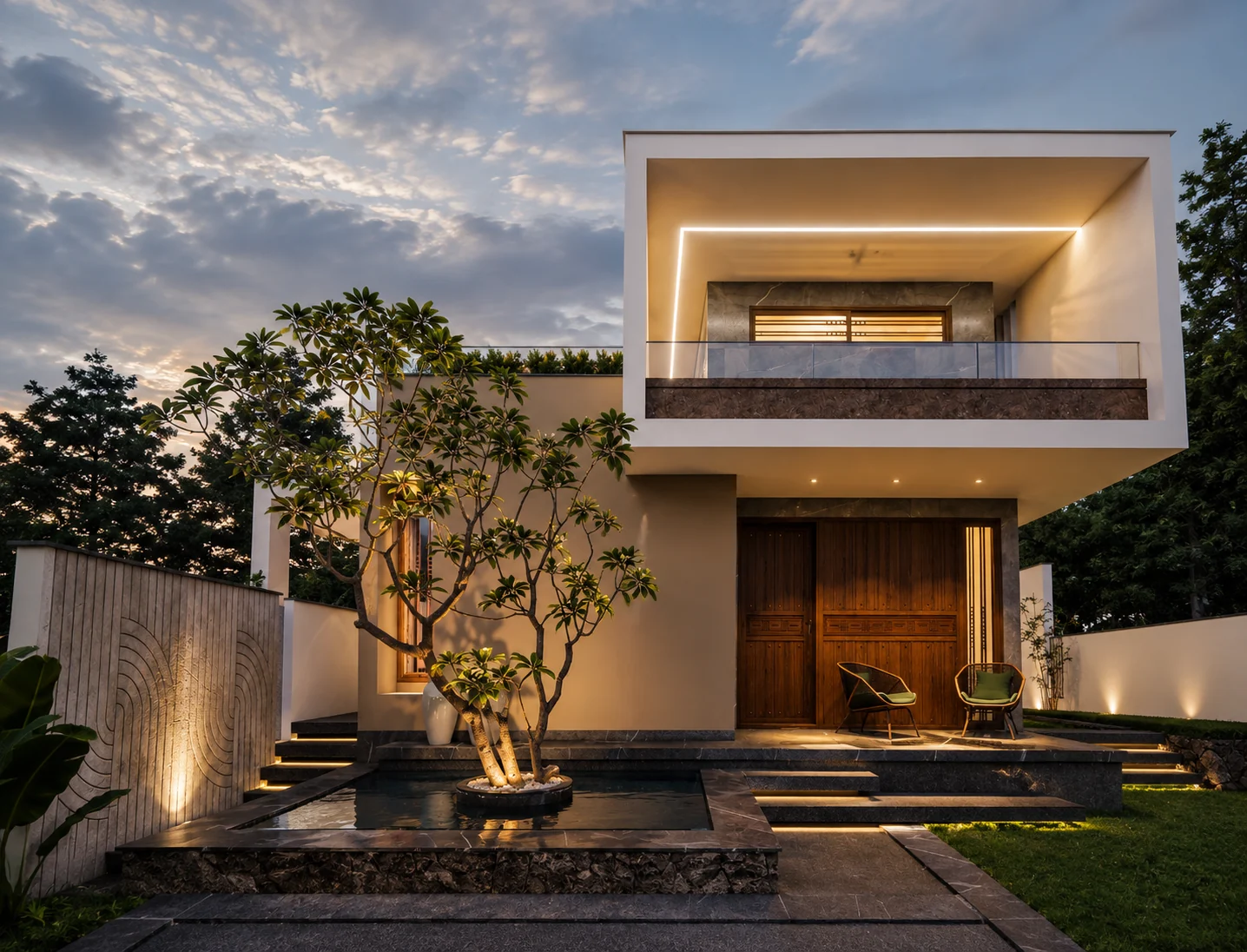 Mountain Cubes Residence in Kottarakara with a projecting upper volume and landscaped entrance