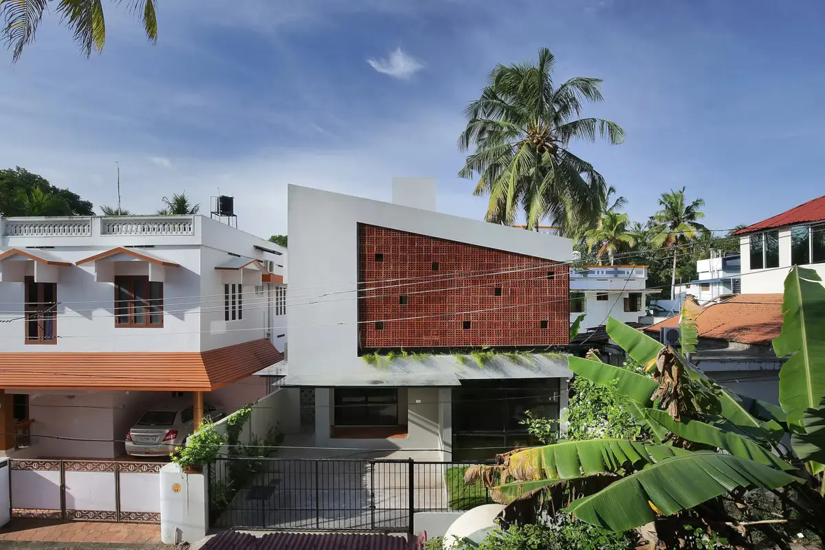 Ruby's Cube Residence with a projecting brick screen