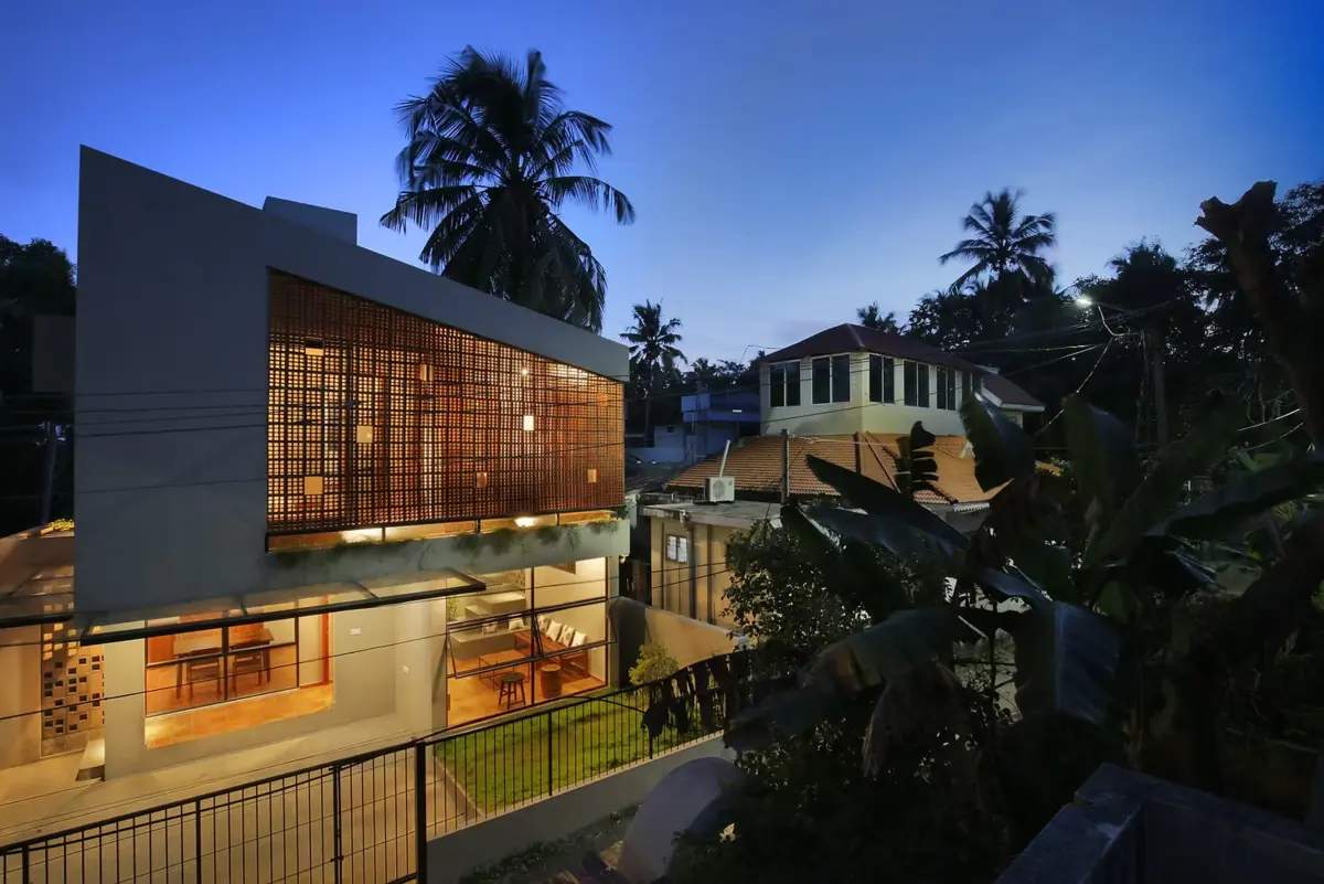 Ruby's Cube Residence illuminated at dusk