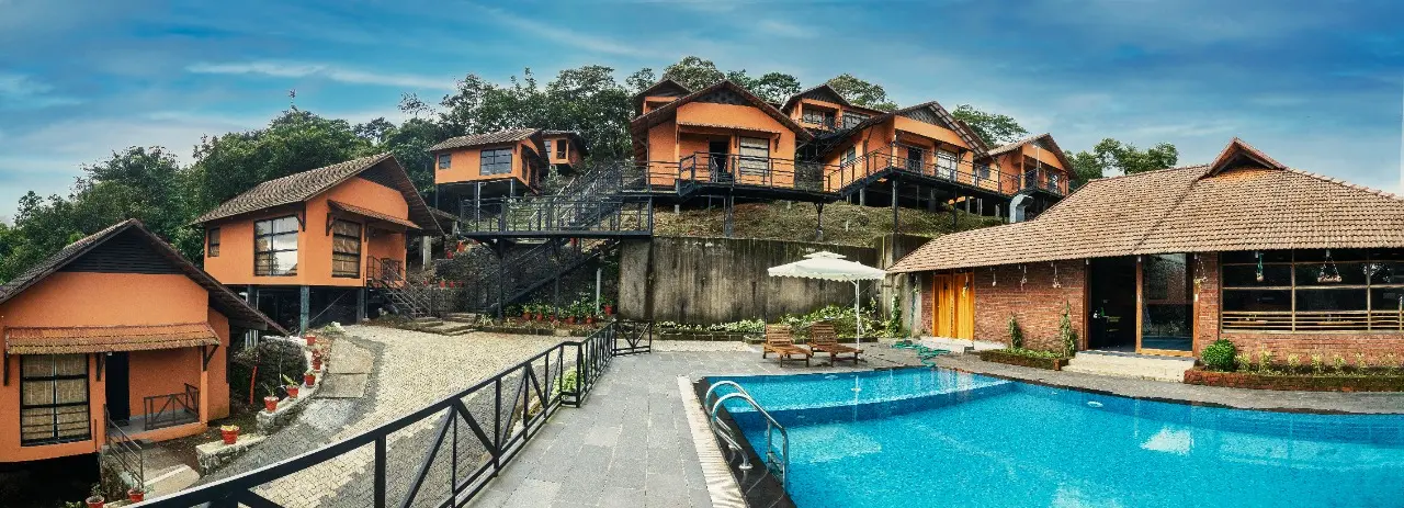 Panoramic view of the resort and infinity pool
