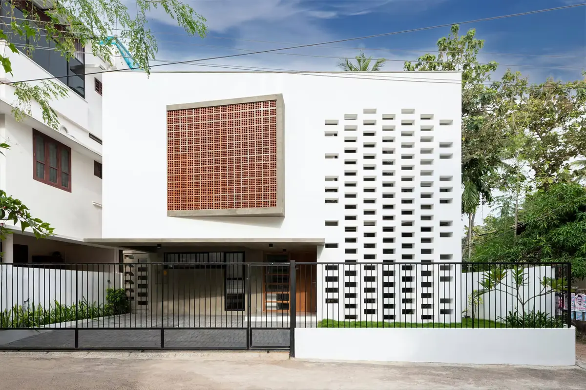 White Skube Residence with its perforated white facade