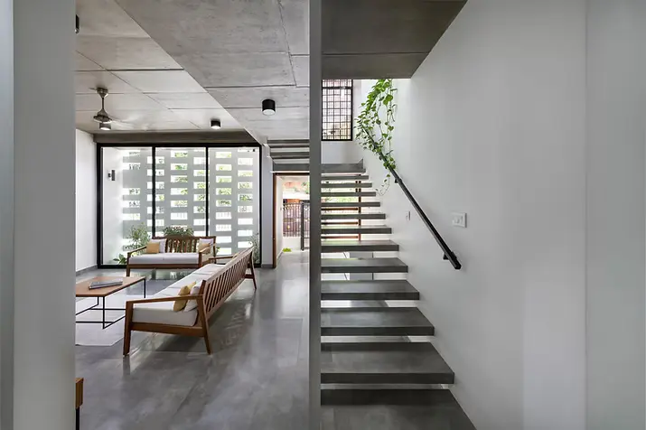 Interior stair beside the perforated facade